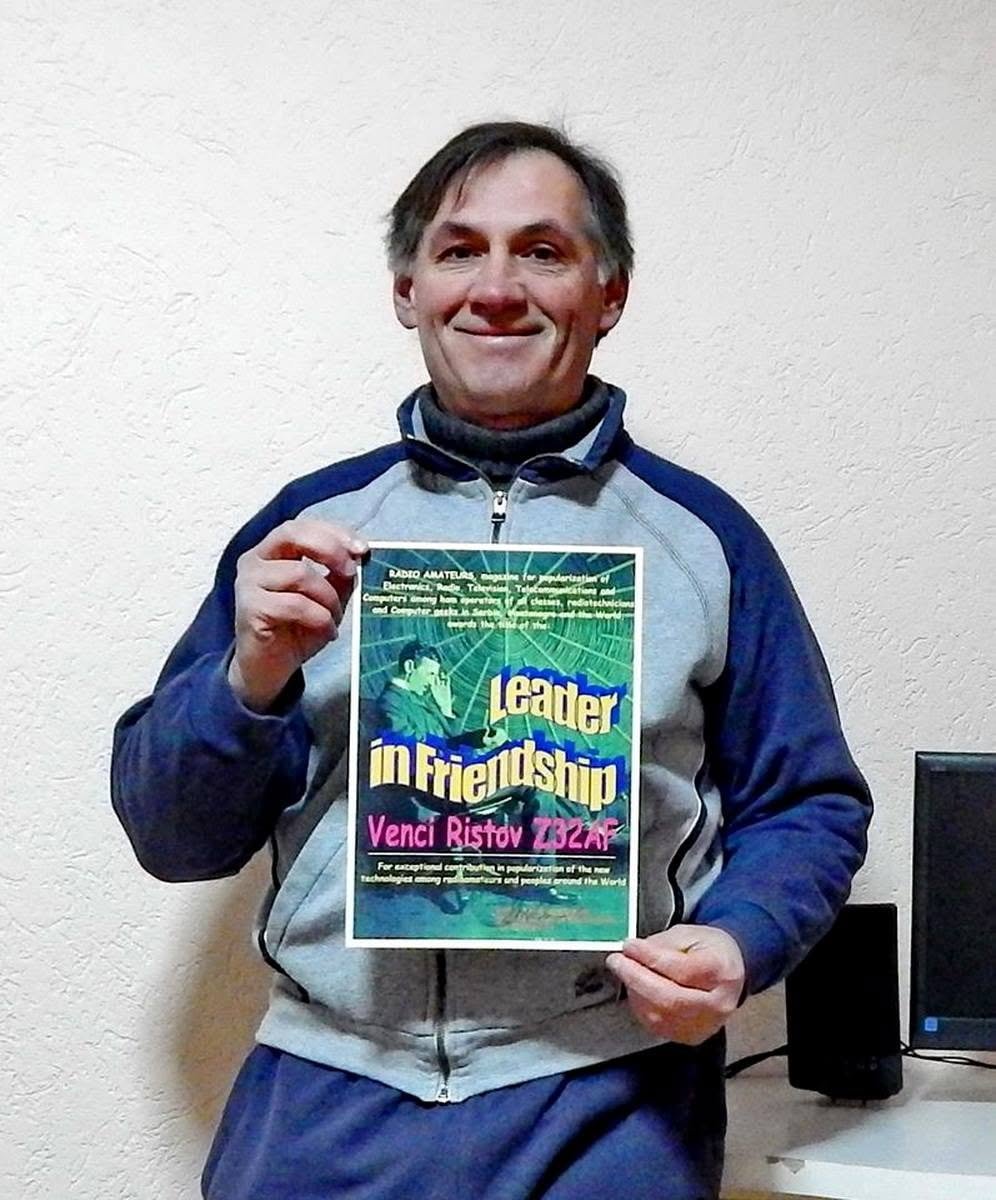 Venci Ristov receiving the Leader in Friendship diploma, 2003